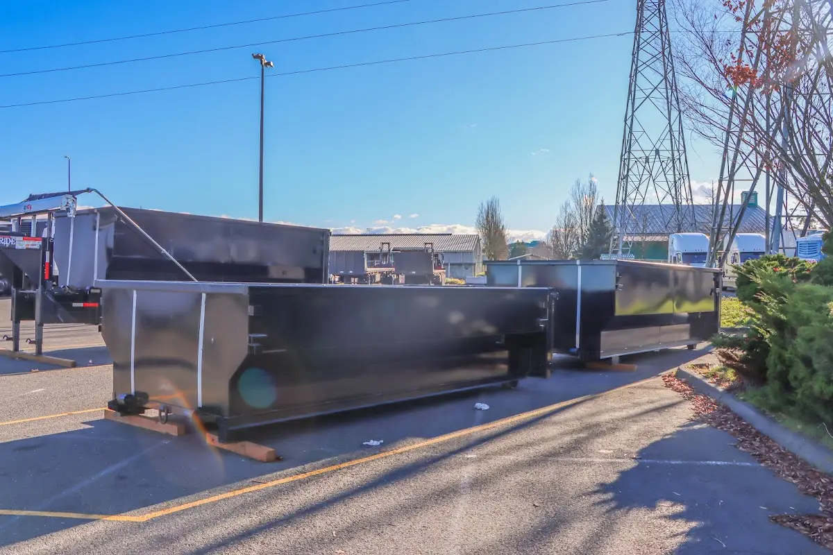 Roll-off dumpster ready for waste disposal at job site for 2 Yard Dumpster Rental in Old Tappan